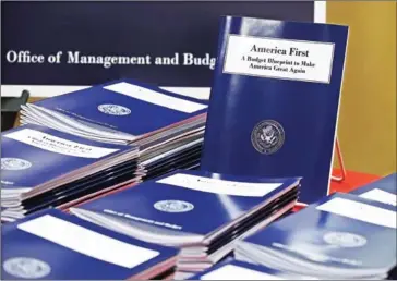  ?? MARK WILSON/GETTY IMAGES/AFP ?? Copies of US President Donald Trump’s overview of budget priorities for FY2018 are on display at the Government Publishing Office yesterday in Washington, DC.