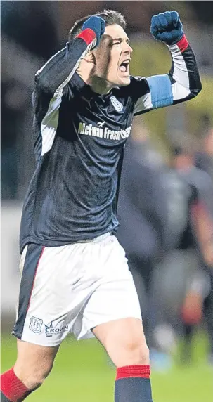  ??  ?? Dundee skipper Darren O’Dea shows his delight at full time against Hearts.