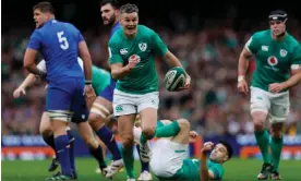  ?? Six Nations. Photograph: Clodagh Kilcoyne/Reuters ?? Johnny Sexton helps Ireland overcome France to move a step closer to winning this year’s