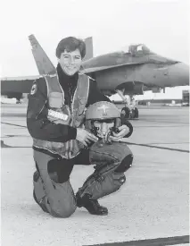  ??  ?? Dee Brasseur with her CF-18 fighter jet.