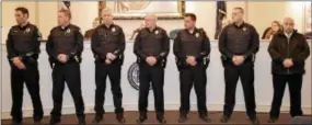  ??  ?? Pictured from left are: Sgt. Hague, Patrolman Smith, Patrolman O’Neill, Patrolman Flick, Patrolman Cugino, Patrolman Ferriola, Det. Billie. A Unit Citation was given to these officers for their actions as a team during an armed home invasion incident...