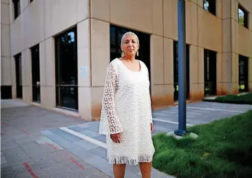  ?? [PHOTO BY DOUG HOKE, THE OKLAHOMAN] ?? Ayanna Najuma, one of the original 13 students who staged a sit-in at Katz Drug Store in 1958, poses for a portrait on the corner of Robinson and Main where the store was located.