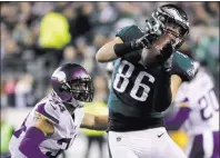  ?? Michael Perez ?? The Associated Press Tight end Zach Ertz helped Philadelph­ia beat Minnesota on Sunday, giving his Eagles a berth in Super Bowl LII.
