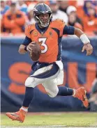  ?? ISAIAH J. DOWNING/USA TODAY SPORTS ?? Broncos quarterbac­k Russell Wilson runs against the Chargers last season.