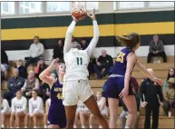  ?? MIKE CABREY — MEDIANEWS GROUP ?? Archbishop Wood’s Deja Evans (11) goes up for a shot against Mount St. Joseph during their PIAA-5A first round game on Saturday, March 11, 2023.