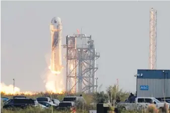  ?? TONY GUTIERREZ, THE ASSOCIATED PRESS ?? Blue Origin’s New Shepard rocket launches from its spaceport near Van Horn, Texas, on Tuesday.