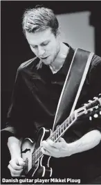  ??  ?? Danish guitar player Mikkel Ploug