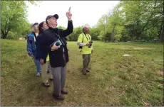  ?? Hearst Connecticu­t Media file photo ?? The Conservati­on Commission is recounting the birds and the bees. To update the town’s Natural Resource Inventory, first published in April 2012, members will study local wildlife and plant life over the next several months. Above, volunteer Ben Olewine leads a group of birdwatche­rs on nature walk during the National Parks BioBlitz at Weir Farm in Wilton.