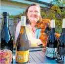  ?? Photo / Paul Taylor ?? Lauren Swift, owner of Haumoanaba­sed Swift Wines, is excited by the prospect of a tourism boost in the region.