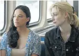  ??  ?? Michelle Rodriguez and Elizabeth Debicki as Linda and Alice.