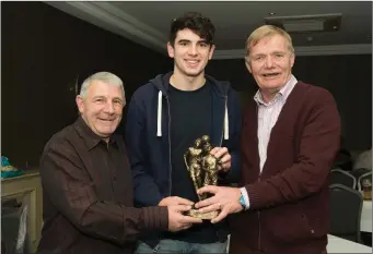  ??  ?? Young player of the year Darragh Noone receiving his award from Seamus Buckley and Lenny Lennox.