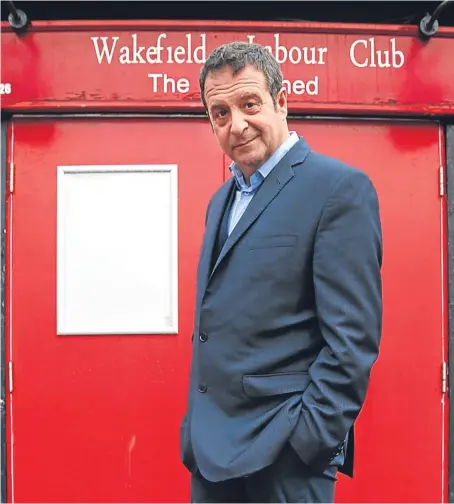  ??  ?? Mark Thomas outside the socialist shed in Wakefield that inspired the name of his latest tour.