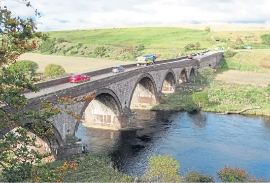  ??  ?? TIME TRAVEL: Cars cross single file over the Lower Northwater Bridge, which was built nearly 250 years ago for horse and carriage.