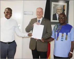  ?? Photo: Contribute­d ?? Preserve… German ambassador Herbert Beck with AFOKA representa­tives Mukoya Edward Diyeve and Joseph Mukoya.