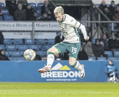  ?? ?? Adam Le Fondre scores in the midweek draw with Ross County. The striker’s return from injury is a timely boost for Hibs