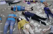  ?? SetH WeniG / ap ?? protesters stage a die-in outside the courthouse where the purdue pharma bankruptcy took place in White plains, n.y.