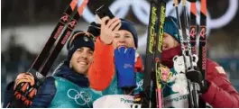  ??  ?? Federico Pellegrino, left, Johannes Hoesflot Klaebo and Alex Bolshunov after the men’s cross- country individual sprint final. JONATHAN NACKSTRAND/ AFP/ Getty Images