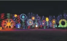  ?? HUANG LERAN / FOR CHINA DAILY ?? From left: Lanterns in the shape of flowers from all four seasons are a feast for the eyes at the Jinsha Site Museum in Chengdu, Sichuan province. Other lanterns at the venue pay homage to sun worship in ancient times.