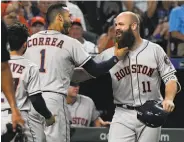  ?? Ed Zurga / Getty Images ?? After three HRs and 10 RBIs against the A’s, Evan Gattis stayed hot with a grand slam in Kansas City.