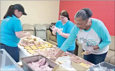  ?? Photo courtesy Janice Zarebski ?? Volunteers make sandwiches for students for Salvation Army's Spring Feeding in 2019. This year, Salvation Army is seeking at least 10 volunteers each day through the end of Spring Break to make or deliver lunches to Union County students.