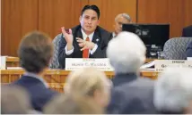  ?? LUIS SÁNCHEZ SATURNO/THE NEW MEXICAN ?? Sen. Howie Morales, D-Silver City, questions New Mexico State University President Garrey Carruthers about the likely effects of higher education funding cuts during a Senate Finance Committee hearing Tuesday.