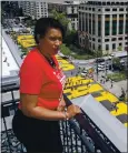  ??  ?? District of Columbia Mayor Muriel Bowser checks out the “Black Lives Matter” mural on 16th Street Friday.