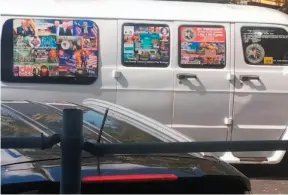  ?? LESLEY ABRAVANEL HAND PHOTO VIA AP ?? This Nov. 1, 2017, photo shows a van with windows covered with an assortment of stickers in Well, Fla. Federal authoritie­s took Cesar Sayoc into custody on Friday and confiscate­d his van, which appears to be the same one, at an auto parts store in Plantation, Fla., in connection with the mail-bomb scare that has targeted prominent Democrats across the U.S.