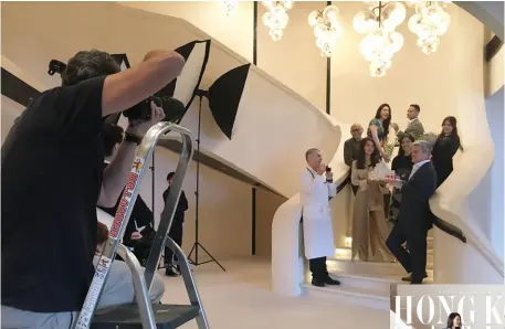  ??  ?? Our cover stars assemble on Rosewood Hong Kong’s curvaceous central staircase, which is carved from limestone