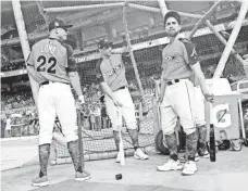  ?? KIM KLEMENT, USA TODAY SPORTS ?? Venezuelan Ender Inciarte, right, with fellow All-Stars Jake Lamb and Paul Goldschmid­t, worries about his nation.