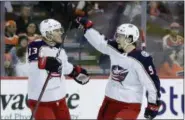  ?? MATT SLOCUM — THE ASSOCIATED PRESS ?? The Columbus Blue Jackets’ Cam Atkinson, left, and Artemi Panarin celebrate after a goal by Atkinson during the first period Thursday in Philadelph­ia.