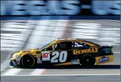  ?? ASSOCIATED PRESS ?? ERIK JONES DRIVES during qualifying for a NASCAR Cup Series auto race at Las Vegas Motor Speedway Friday in Las Vegas. Jones won the pole position.