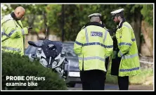  ?? ?? PROBE Officers examine bike