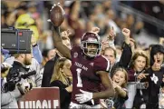  ?? AP ?? Texas A&M’s Quartney Davis celebrates a touchdown catch during the seventh overtime of a game against LSU in 2018. To shorten overtime games, the NCAA on Friday recommende­d requiring teams to go for two when games reach the second overtime instead of the third.