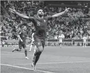  ?? Alessandra Tarantino/associated Press ?? Portugal's Goncalo Ramos celebrates after scoring his side's fifth goal Tuesday against Switzerlan­d.