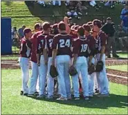  ?? MIKE STRIBL — DAILY FREEMAN ?? Kingston players huddle before batting in the bottom of the seventh inning of Tigers’ loss to Liverpool in Friday’s Class AA state semifinal.