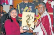  ?? PTI ?? President Droupadi Murmu confers Arjuna Award on Haryana’s Sarita for her achievemen­ts in wrestling at Rashtrapat­i Bhavan in New Delhi on Wednesday.