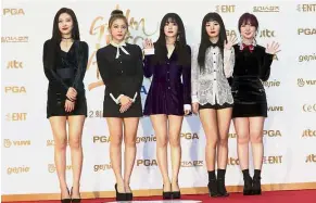  ?? — AP ?? Crossing boundaries: Girl band Red Velvet flew from Seoul’s Gimpo airport aboard a chartered civilian flight to Pyongyang for a concert.