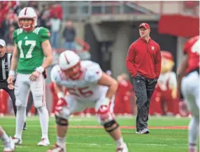  ??  ?? Nebraska’s Scott Frost coaches from the field during the spring game in Lincoln, Neb., Saturday. JOHN PETERSON/AP
