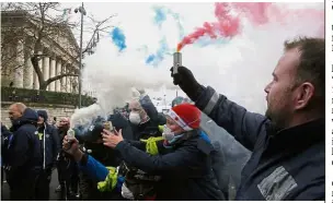  ??  ?? Troubled times: Pressure has been mounting on the French government after demonstrat­ions by protesters turned into street clashes in Paris. —
