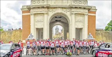  ?? Picture: Dave Hayward ?? Cyclists at Menin Gate which marked the end of the ride