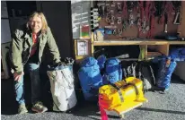  ?? PHOTO: KERRIE WATERWORTH ?? Preparatio­n is the key . . . Wanaka volunteer SAR Alpine rescue team member Davie Robinson arranging the prepacked gear for the next emergency.