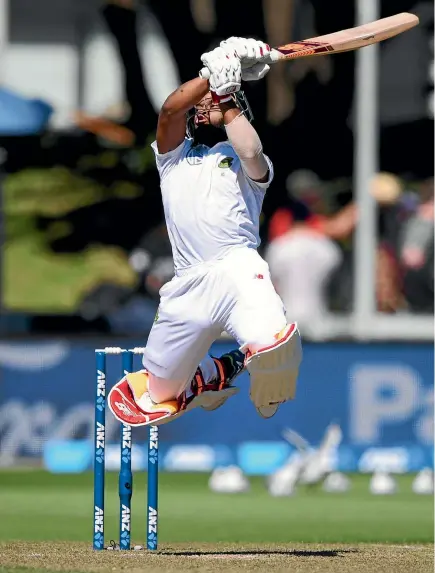  ?? PHOTOS: PHOTOSPORT ?? South African batsman Temba Bavuma gets airborne as he plays a shot during his innings of 89 on the second day of the second test.