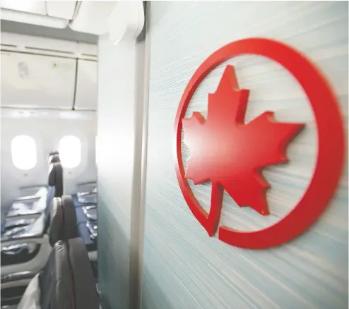  ?? Peter J Thompson / national
post files ?? Air Canada raised $1.6 billion through a sale of shares and bonds, bringing its cash reserves to $10 billion, which
means it could afford payments on a short-term loan to pay for passenger refunds, Kelly Mcparland writes.