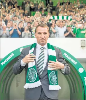  ??  ?? ALL CHANGE: Brendan Rodgers is unveiled to the Parkhead support . . . ‘He was a fantastic step for the Celtic board to take,’ says Deila.