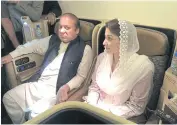  ??  ?? BAD FLIGHT: Former prime minister Nawaz Sharif and his daughter Maryam Nawaz siting on a plane after their arrival in Lahore.