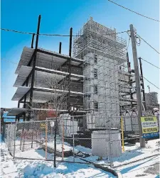  ?? JOHN RENNISON THE HAMILTON SPECTATOR ?? Marbelle Estates Inc. recently resumed work on the so-called Jamesville Lofts, an unfinished condo project at 15 Cannon St. W. that was in limbo in January 2022 after its previous builder went bankrupt.