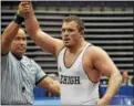  ?? COURTESY LEHIGH ATHLETICS ?? Lehigh’s Jordan Wood (Boyertown) has his arm raised after winning the heavyweigh­t title at the EIWA Championsh­ips on March 4.