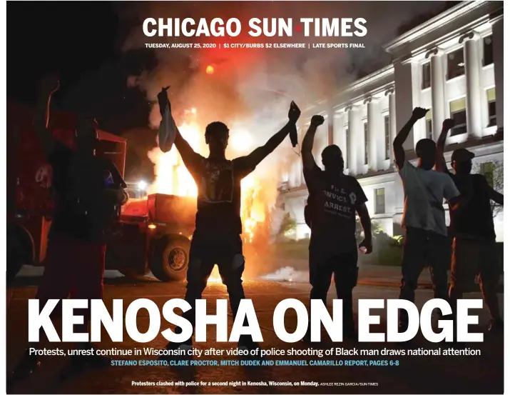  ?? ASHLEE REZIN GARCIA/SUN-TIMES ?? Protesters clashed with police for a second night in Kenosha, Wisconsin, on Monday.