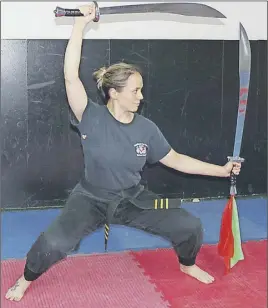  ?? EARL LATTIE/SPECIAL TO THE TRURO DAILY NEWS ?? Brenna Urquhart, is a third degree black belt in PaiLum Kungfu, a first degree black belt in Kajukenpo Karate, and an internatio­nal medalist.