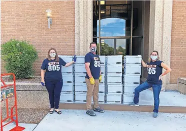  ?? [PHOTO PROVIDED] ?? Members of the Yes on 802 campaign turned in signatures to qualify for the ballot to the secretary of state's office Monday. The campaign turned in far more signatures than were required.